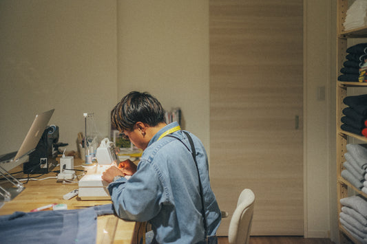 man using sewing-machine 